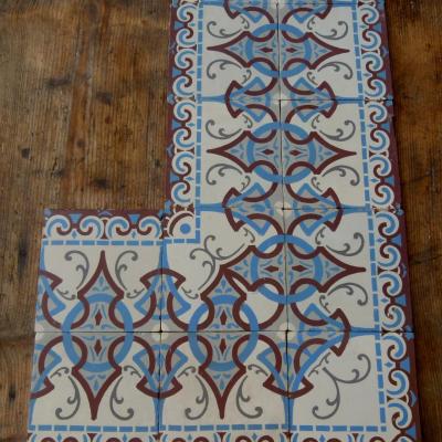 Large run of ceramic back to back art nouveau border tiles