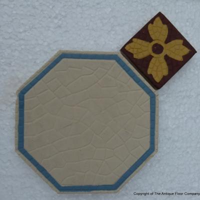 A handmade Boch Freres floor of octagon tiles with cabochons