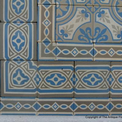 A 7.75m2+ antique ceramic floor in light grey, blue and cream