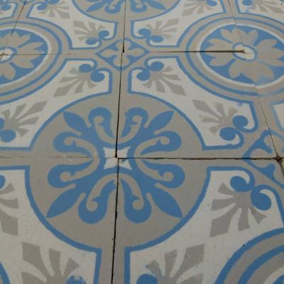 A 7.75m2+ antique ceramic floor in light grey, blue and cream