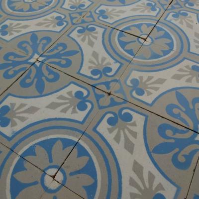 A 7.75m2+ antique ceramic floor in light grey, blue and cream