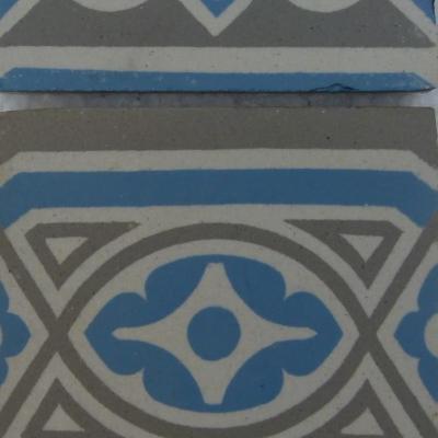 A 7.75m2+ antique ceramic floor in light grey, blue and cream