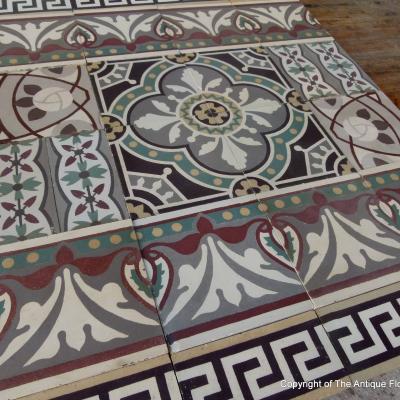 Patchwork of antique ceramic Belgian tiles - late 19th, early 20th century