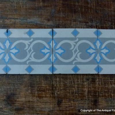 24 antique ceramic border tiles manufactured by Octave Colozier c.1912