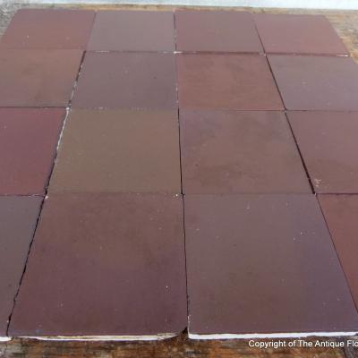 16 antique French ceramic tiles in aubergine