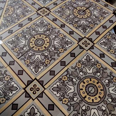 An impressive c.22.5m2 handmade Boch Freres ceramic floor with cabachons