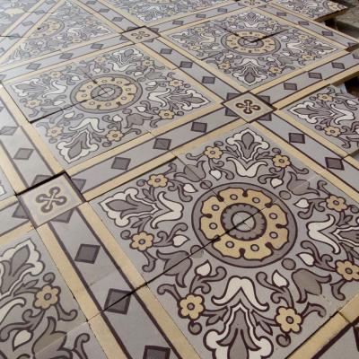 An impressive c.22.5m2 handmade Boch Freres ceramic floor with cabachons