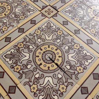 An impressive c.22.5m2 handmade Boch Freres ceramic floor with cabachons