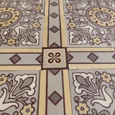 An impressive c.22.5m2 handmade Boch Freres ceramic floor with cabachons