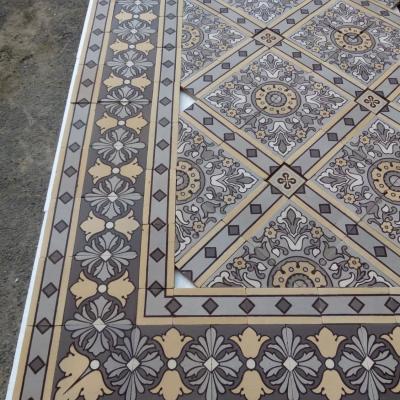 An impressive c.22.5m2 handmade Boch Freres ceramic floor with cabachons