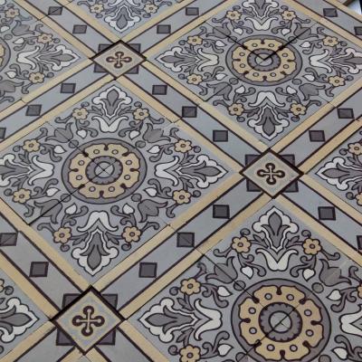 An impressive c.22.5m2 handmade Boch Freres ceramic floor with cabachons