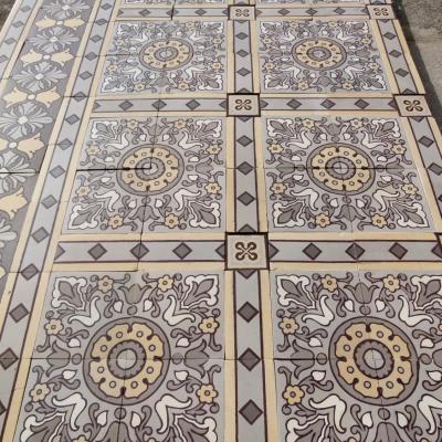 An impressive c.22.5m2 handmade Boch Freres ceramic floor with cabachons