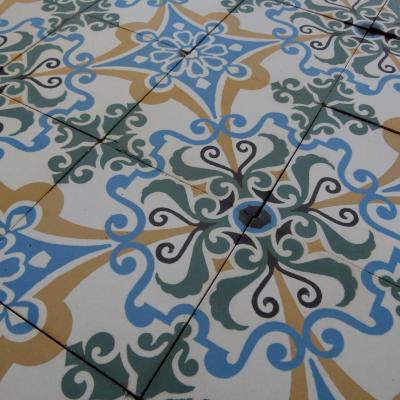 A small, 10.5m2, antique Maubeuge ceramic tile