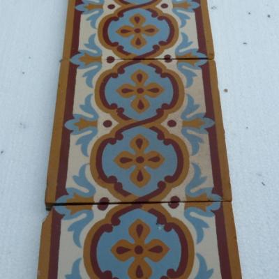 A large run of antique Maubeuge border tiles plus corners