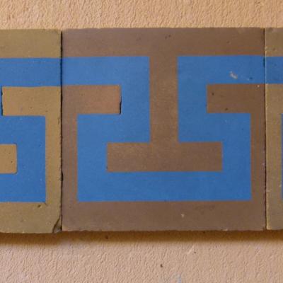 Small run of geometric antique French border tiles