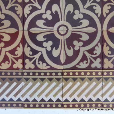 A Sand & Cie heritage ceramic with geometric borders 5.8m2