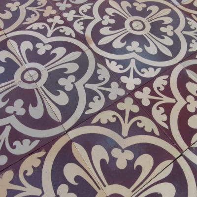 A Sand & Cie heritage ceramic with geometric borders 5.8m2