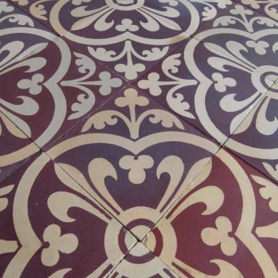 A Sand & Cie heritage ceramic with geometric borders 5.8m2